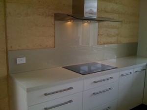 Splashback on rammed earth wall